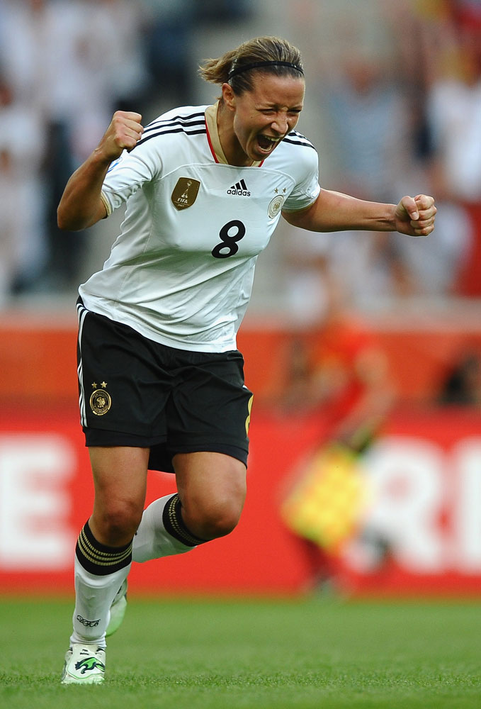 Inka Grings celebrates scoring for Germany against France